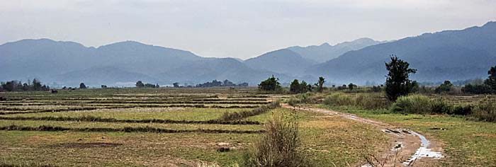 Muang Sing's Surroundings - Rice Paddies and Mountains - by Asienreisender